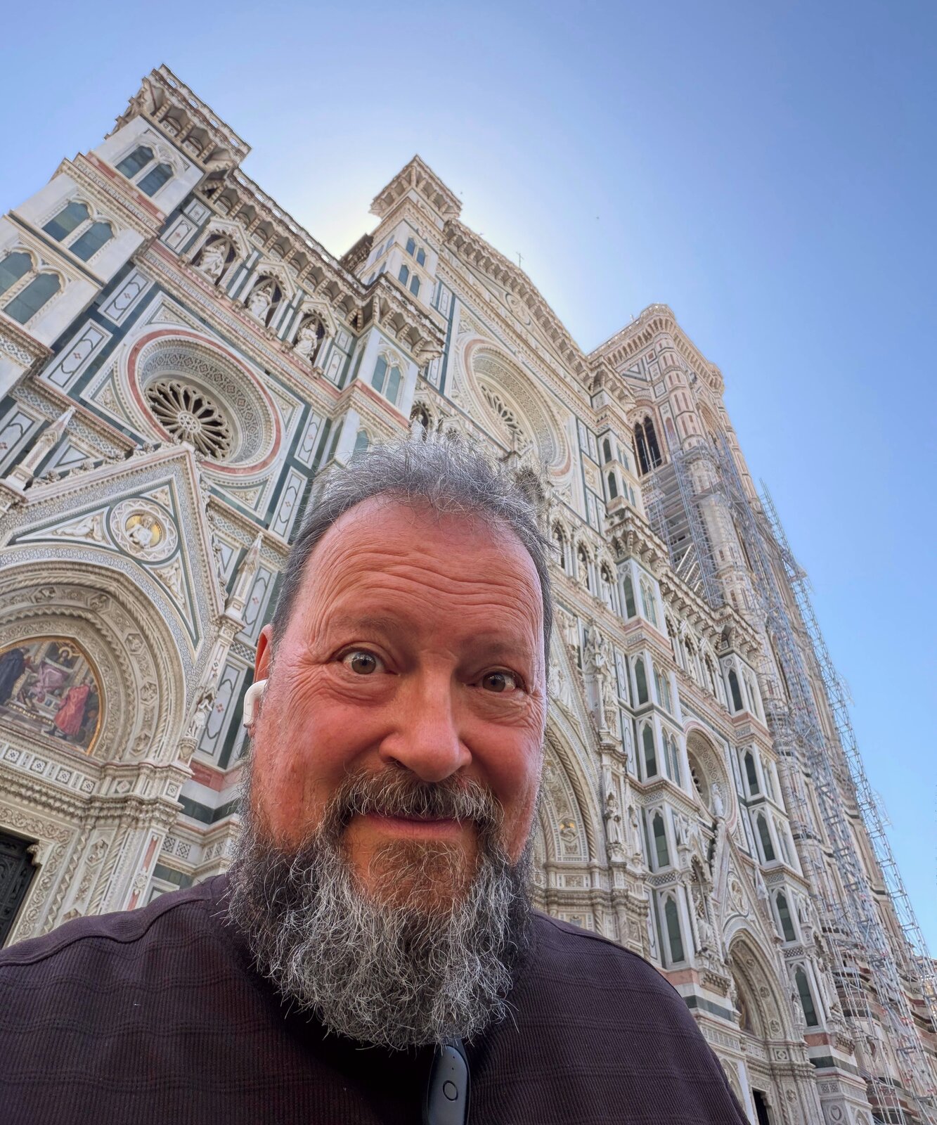 David Orban smiling in front of the facade of Florence's Cathedral of Santa Maria del Fiore